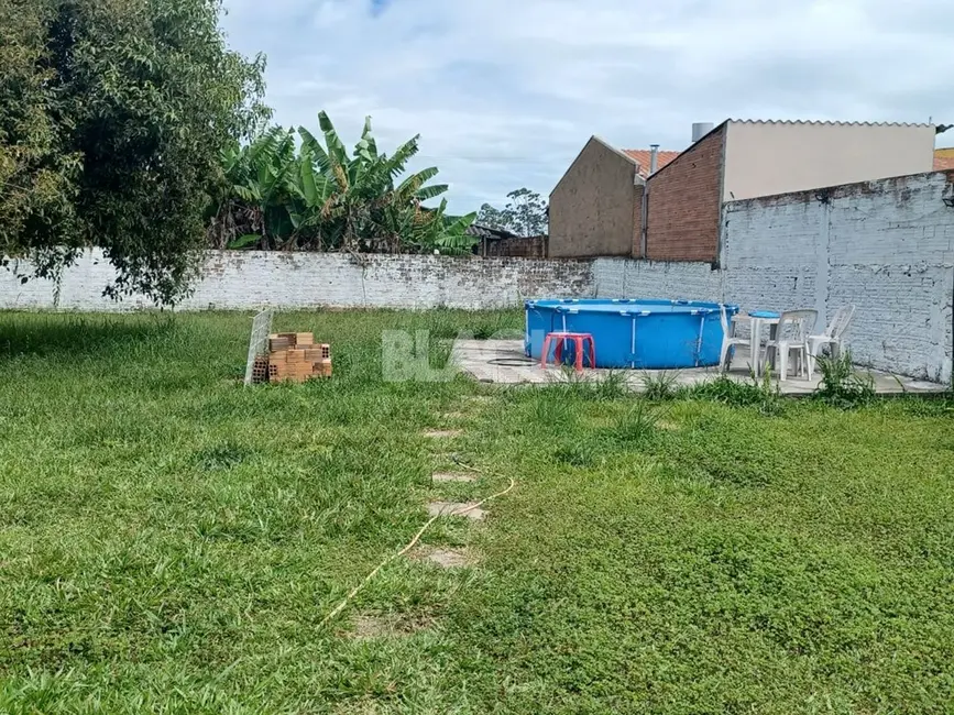 Foto 3 de Casa com 3 quartos à venda, 100m2 em Torres - RS