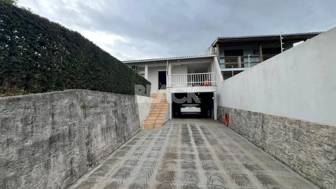 Foto 3 de Casa com 4 quartos à venda, 140m2 em Torres - RS