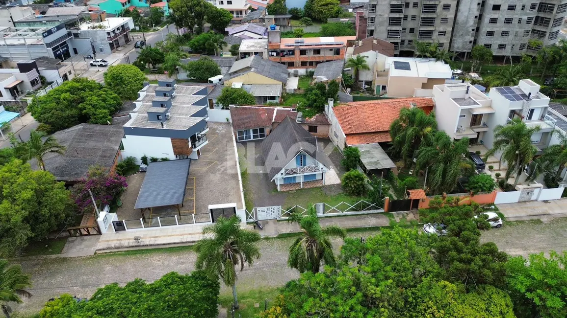 Foto 1 de Casa com 2 quartos à venda, 150m2 em Torres - RS