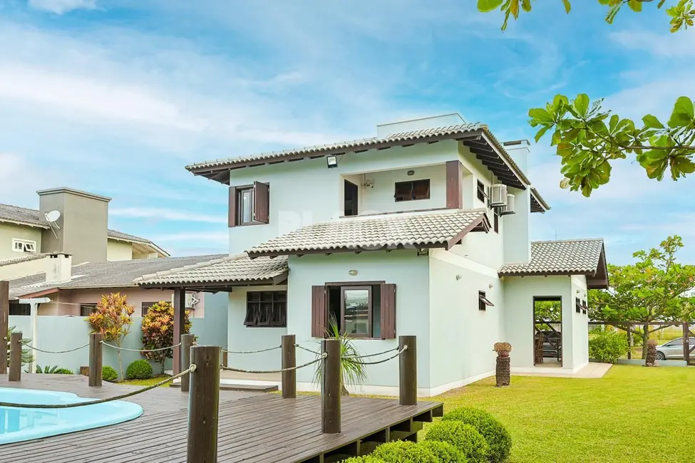 Foto 6 de Casa com 4 quartos à venda, 186m2 em Torres - RS