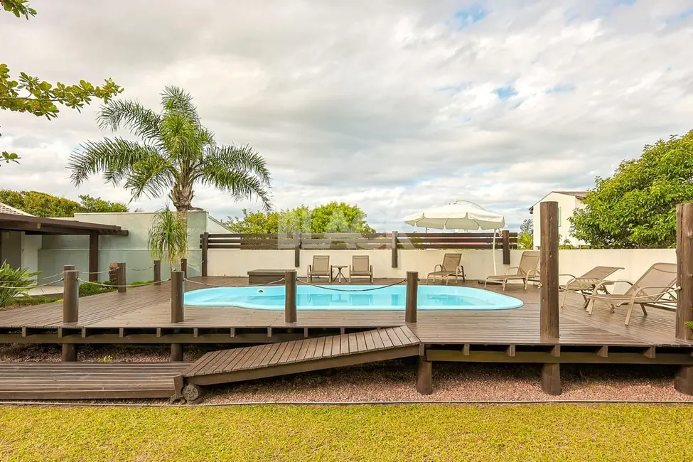 Foto 9 de Casa com 4 quartos à venda, 186m2 em Torres - RS