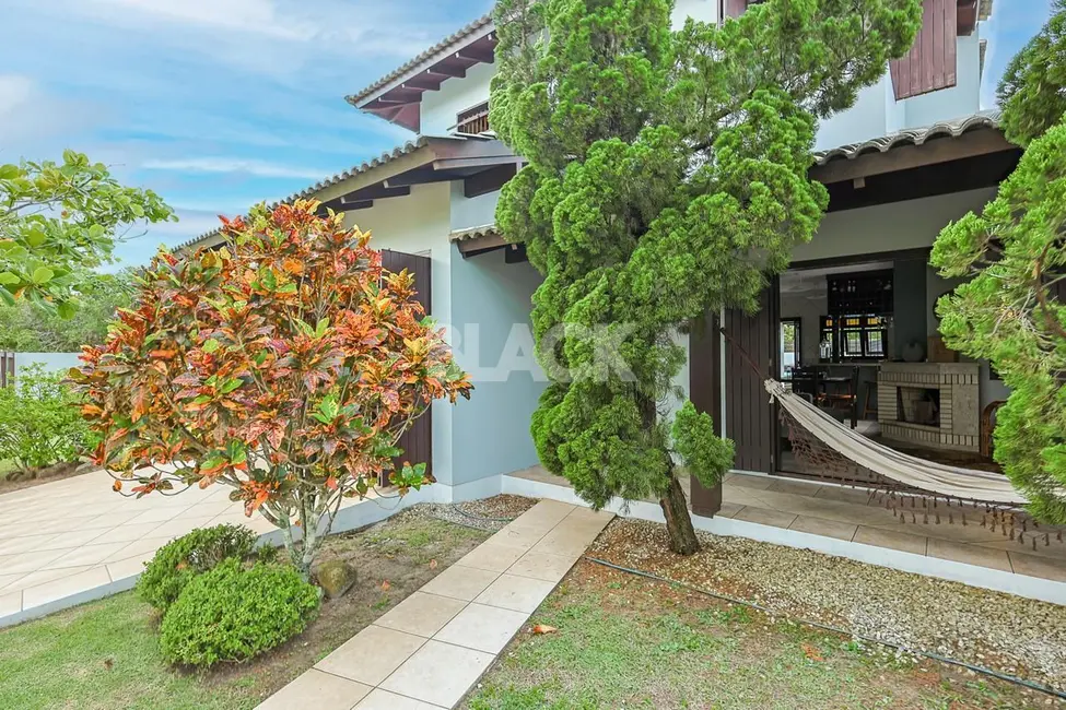 Foto 4 de Casa com 4 quartos à venda, 186m2 em Torres - RS