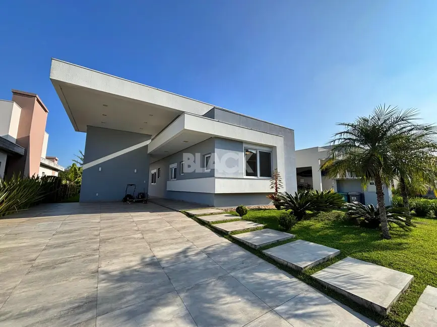 Foto 2 de Casa de Condomínio com 4 quartos à venda, 230m2 em Torres - RS