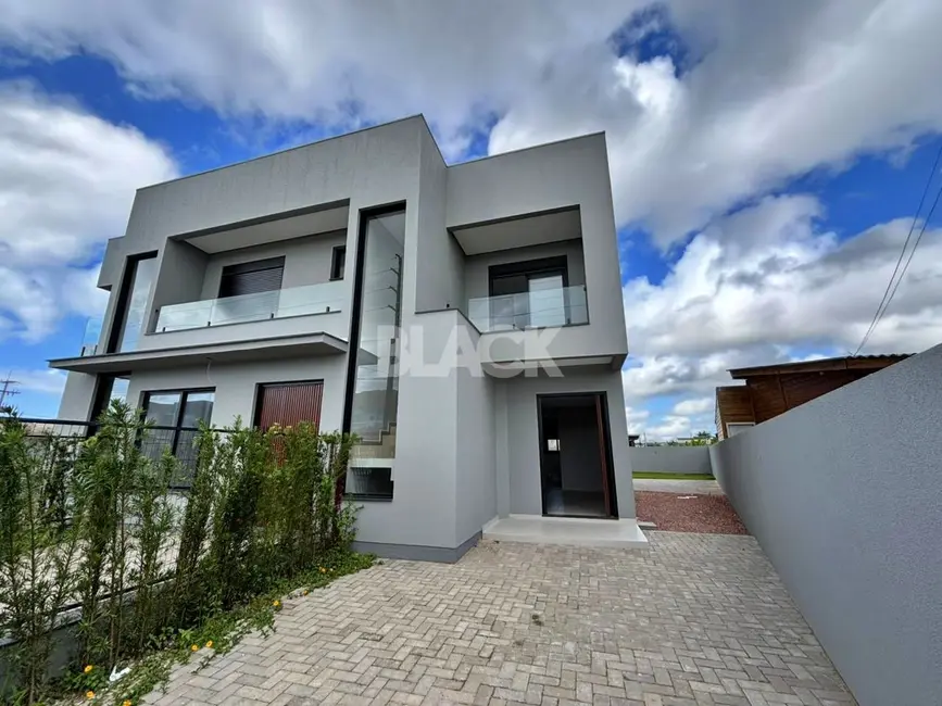 Foto 1 de Sobrado com 3 quartos à venda, 134m2 em Torres - RS