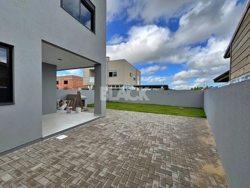 Foto 8 de Sobrado com 3 quartos à venda, 134m2 em Torres - RS