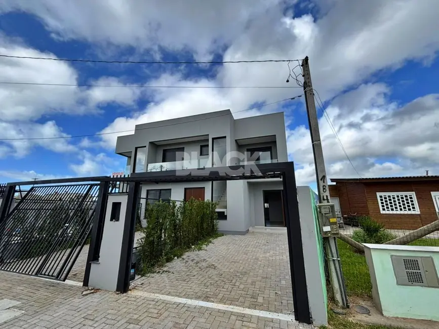 Foto 2 de Sobrado com 3 quartos à venda, 134m2 em Torres - RS