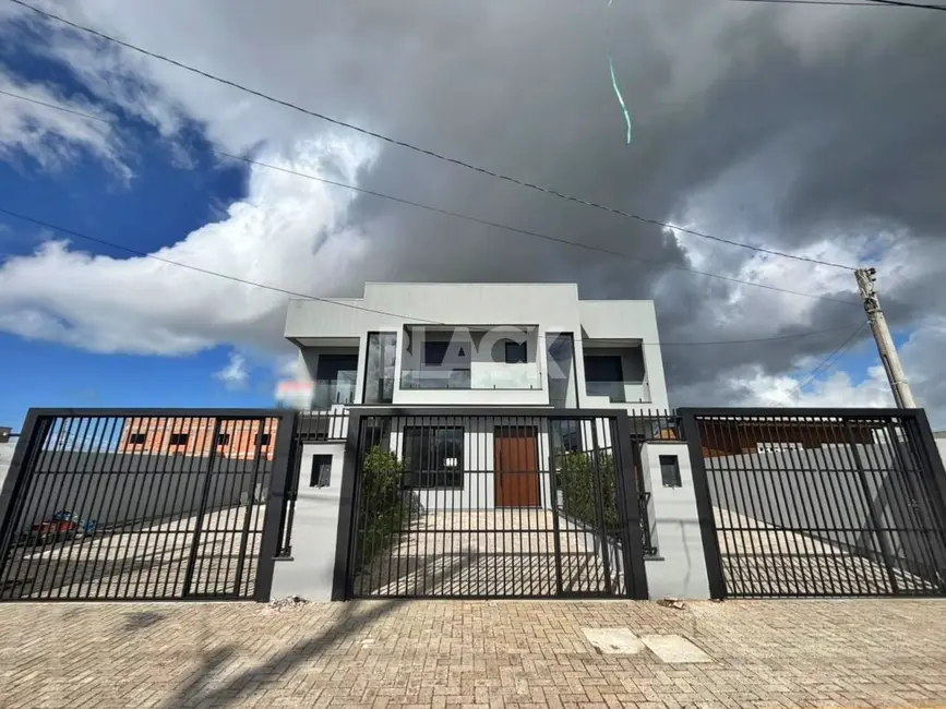 Foto 1 de Sobrado com 3 quartos à venda, 134m2 em Torres - RS
