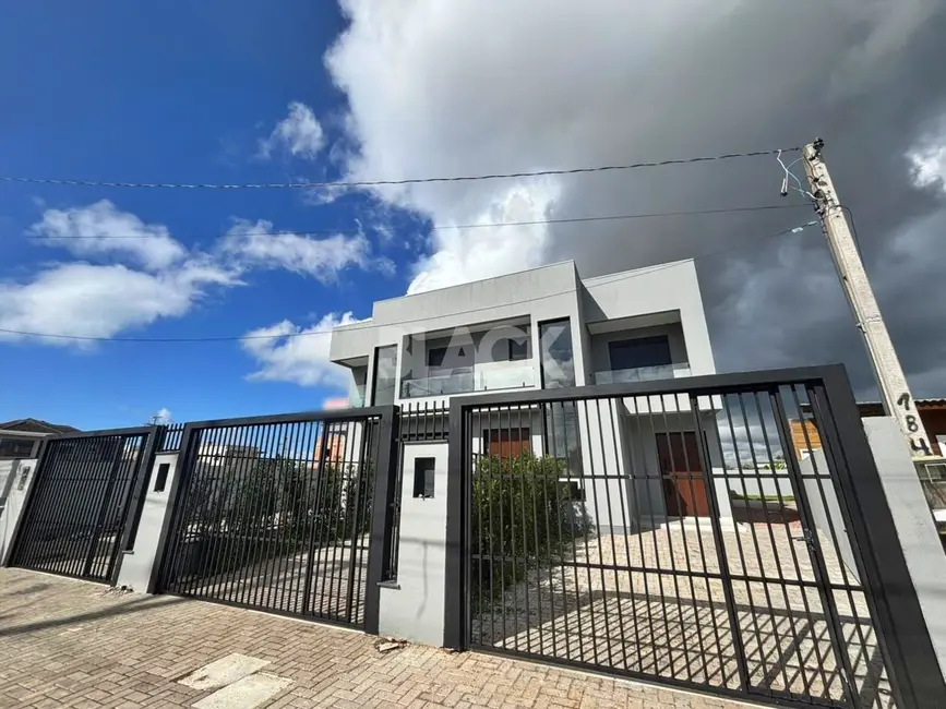 Foto 2 de Sobrado com 3 quartos à venda, 134m2 em Torres - RS