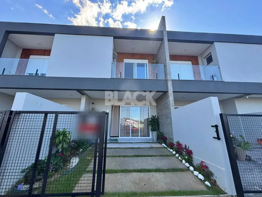 Foto 2 de Sobrado com 2 quartos à venda, 98m2 em Torres - RS