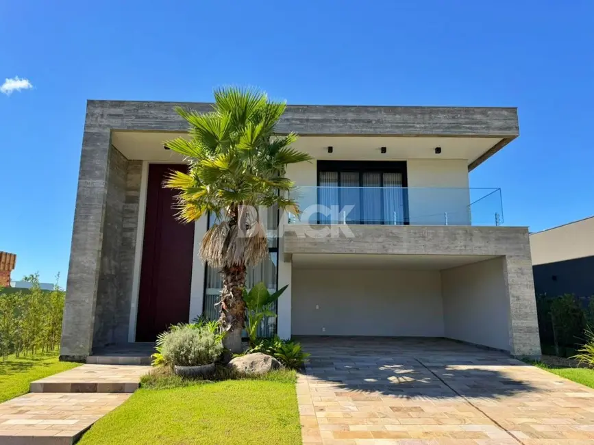Foto 1 de Casa de Condomínio com 4 quartos à venda, 311m2 em Torres - RS