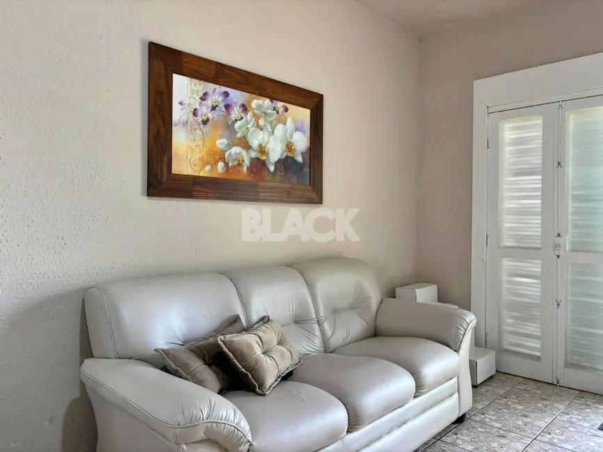 Foto 6 de Casa com 4 quartos à venda, 171m2 em Torres - RS