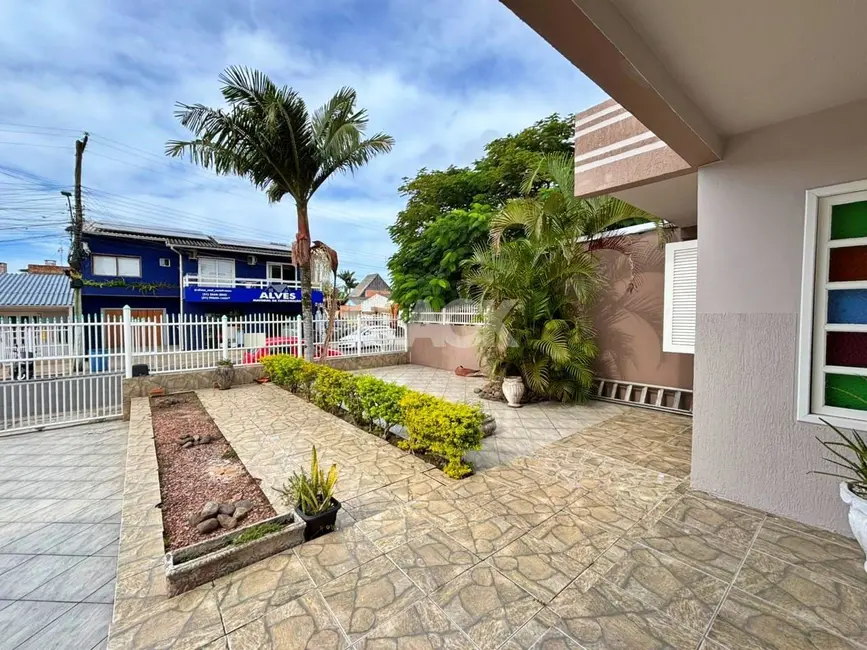 Foto 3 de Casa com 4 quartos à venda, 171m2 em Torres - RS