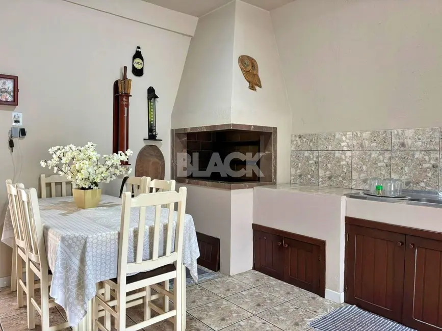 Foto 8 de Casa com 4 quartos à venda, 171m2 em Torres - RS