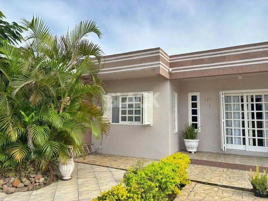 Foto 2 de Casa com 4 quartos à venda, 171m2 em Torres - RS
