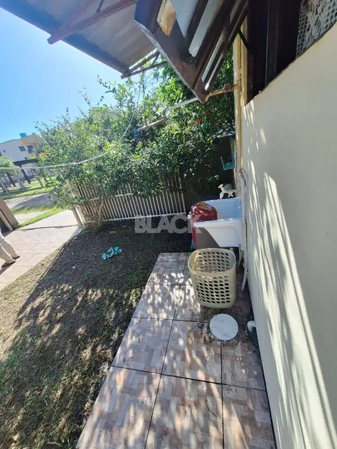 Foto 6 de Casa com 3 quartos à venda, 85m2 em Torres - RS