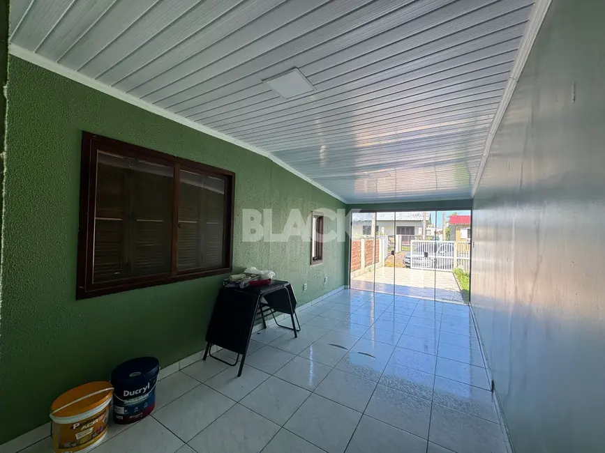 Foto 9 de Casa com 2 quartos à venda, 88m2 em Torres - RS