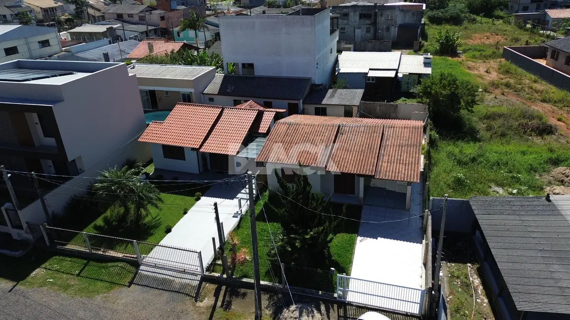 Foto 3 de Casa com 2 quartos à venda, 88m2 em Torres - RS