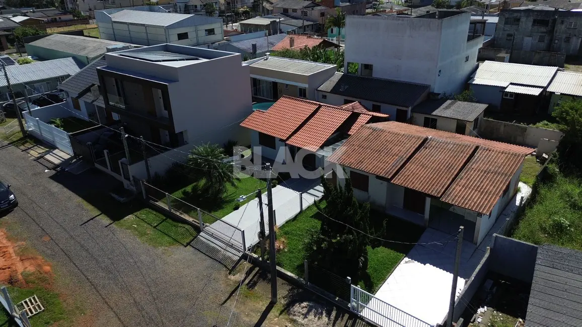 Foto 1 de Casa com 2 quartos à venda, 88m2 em Torres - RS