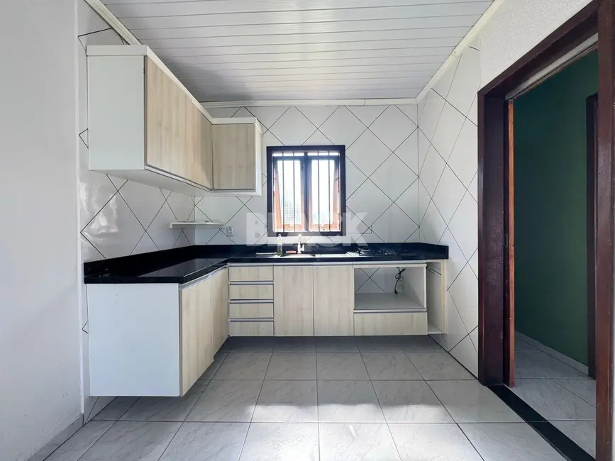 Foto 6 de Casa com 2 quartos à venda, 88m2 em Torres - RS