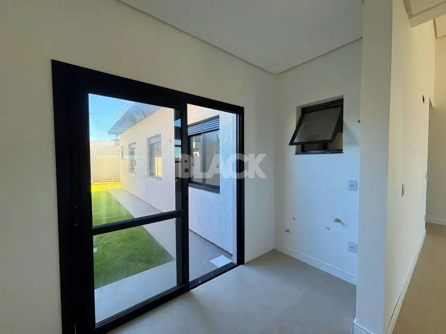 Foto 6 de Casa com 3 quartos à venda, 110m2 em Torres - RS