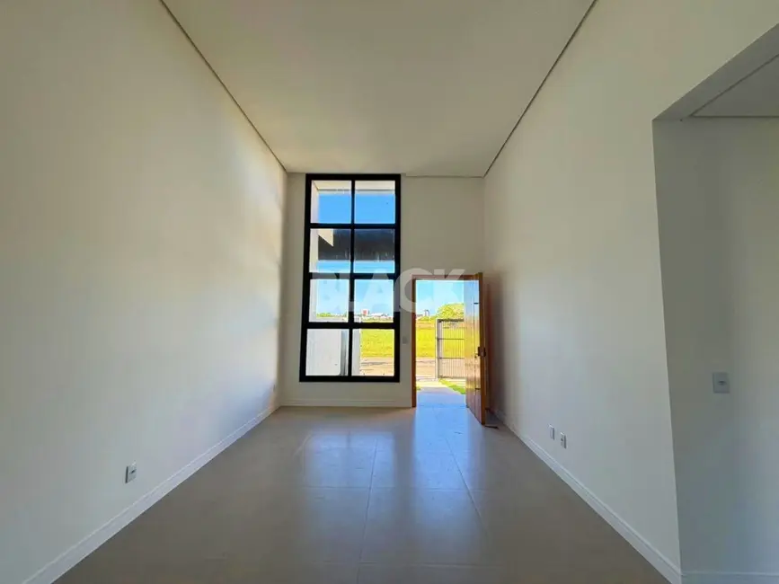 Foto 4 de Casa com 3 quartos à venda, 110m2 em Torres - RS
