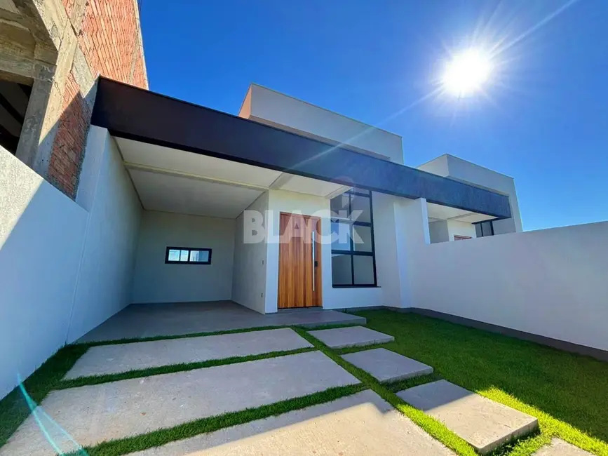 Foto 1 de Casa com 3 quartos à venda, 110m2 em Torres - RS