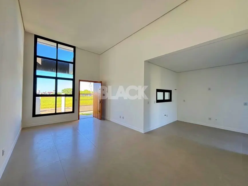 Foto 3 de Casa com 3 quartos à venda, 110m2 em Torres - RS