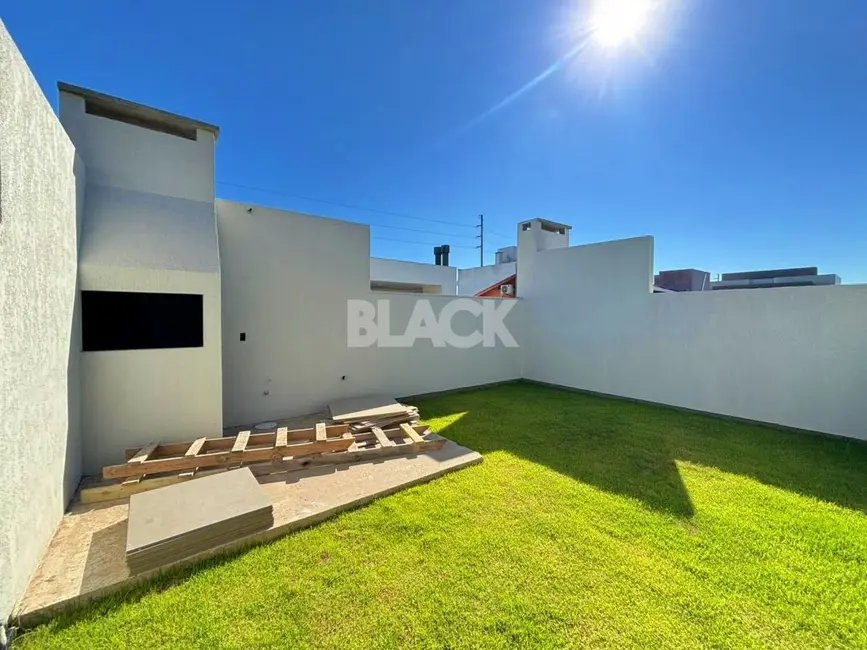 Foto 9 de Casa com 3 quartos à venda, 110m2 em Torres - RS