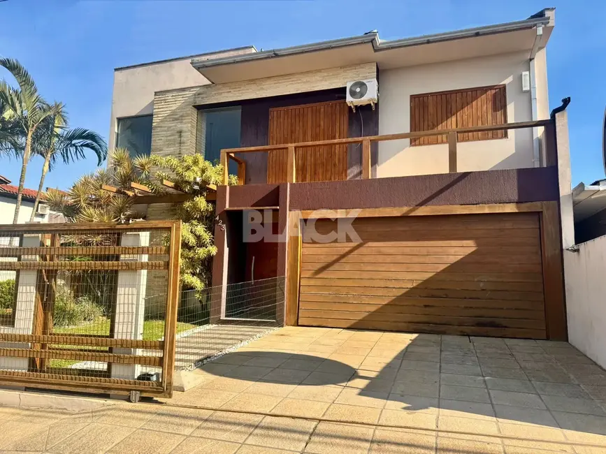 Foto 3 de Casa com 4 quartos à venda, 273m2 em Torres - RS