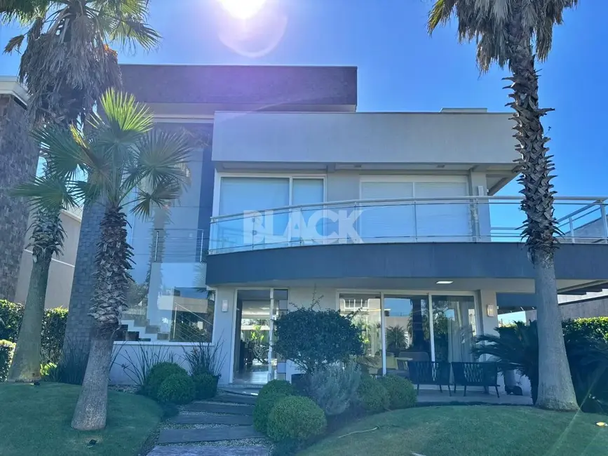 Foto 2 de Casa de Condomínio com 4 quartos à venda, 368m2 em Torres - RS
