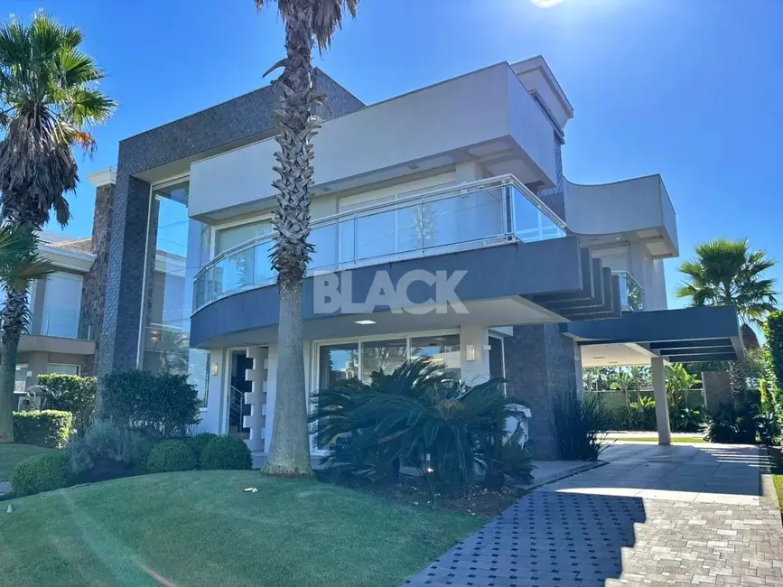 Foto 4 de Casa de Condomínio com 4 quartos à venda, 368m2 em Torres - RS