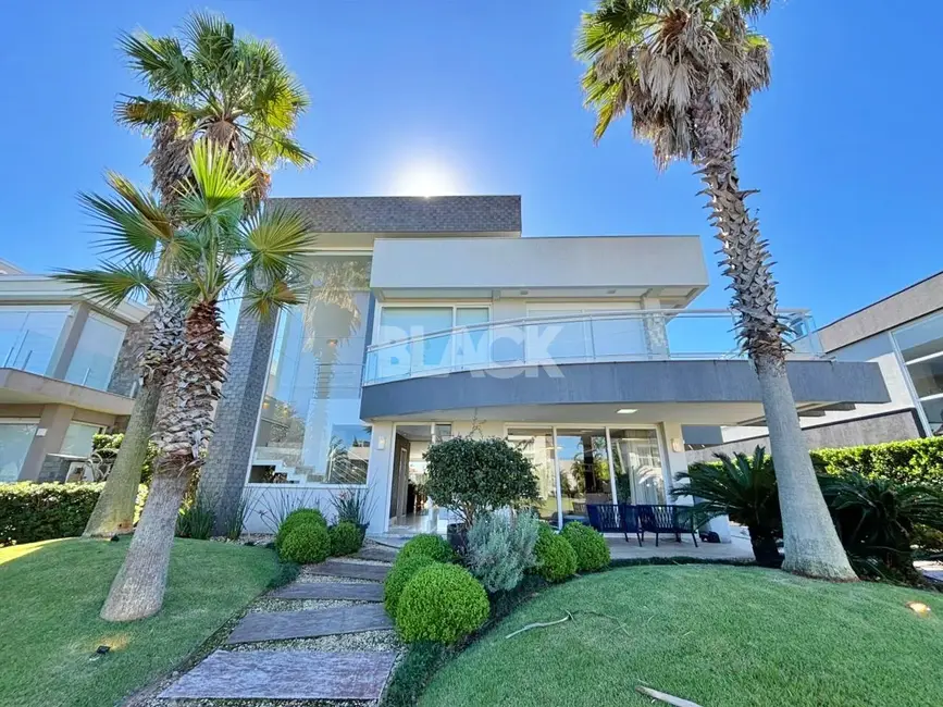 Foto 1 de Casa de Condomínio com 4 quartos à venda, 368m2 em Torres - RS