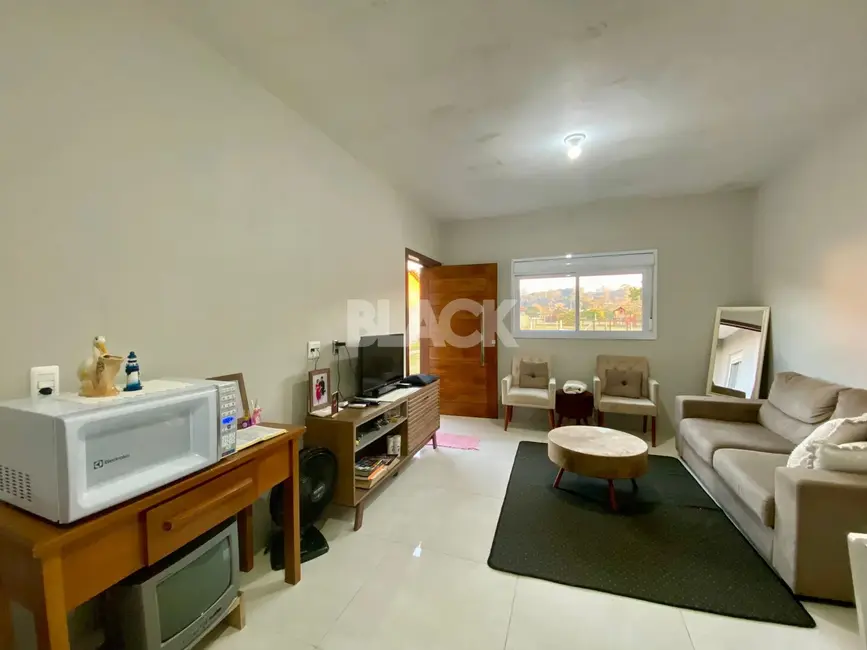Foto 8 de Casa com 1 quarto à venda, 48m2 em Torres - RS