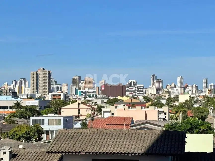 Foto 6 de Apartamento com 3 quartos à venda, 69m2 em Torres - RS