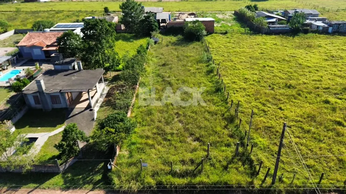 Foto 1 de Terreno / Lote à venda, 900m2 em Torres - RS