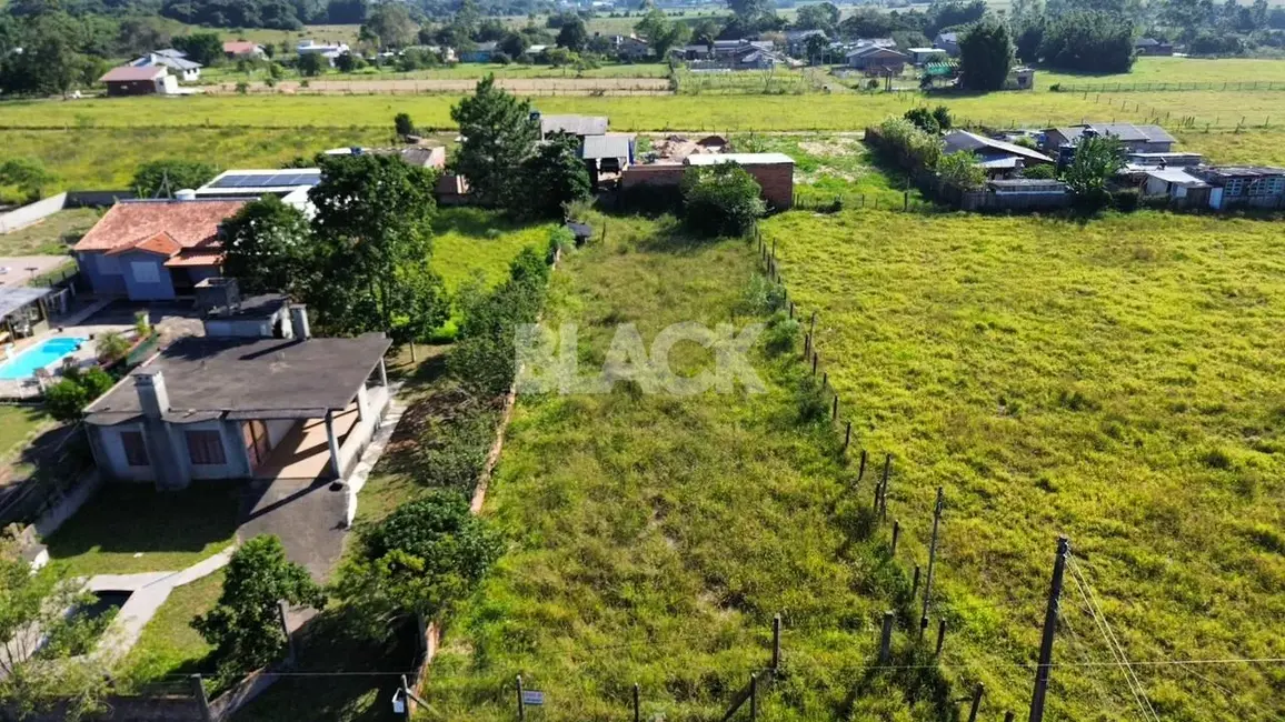 Foto 2 de Terreno / Lote à venda, 900m2 em Torres - RS