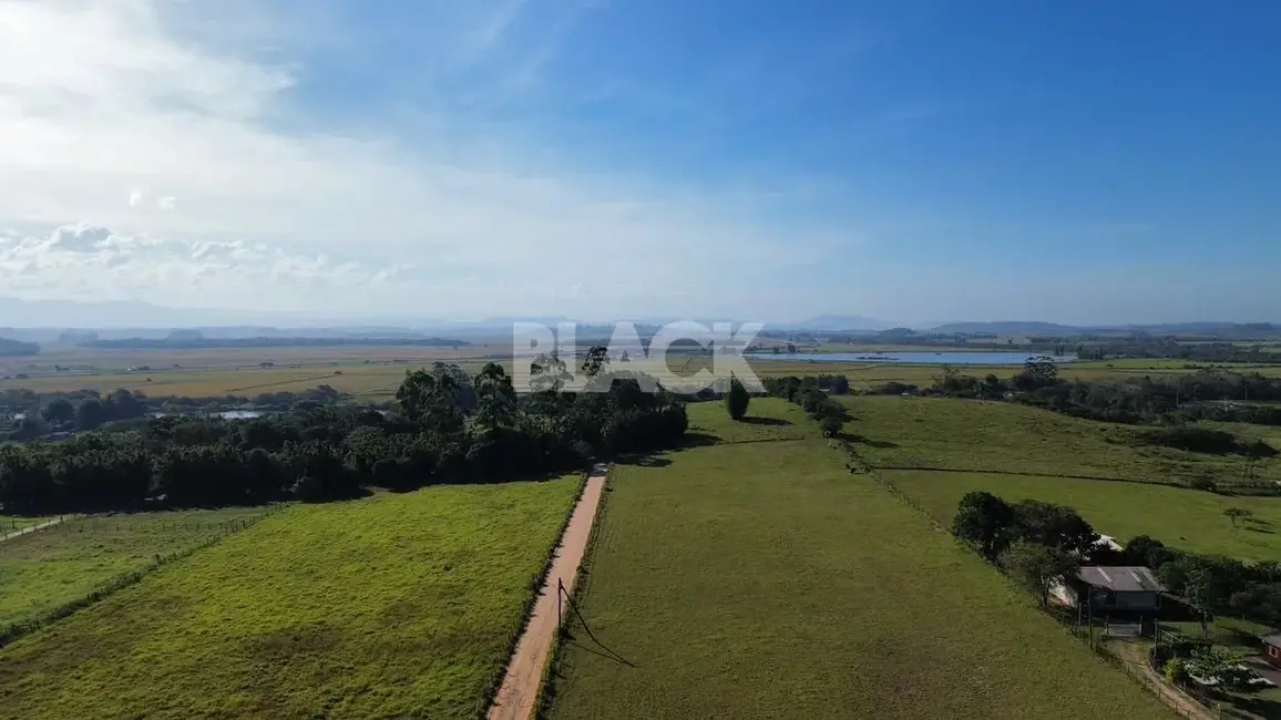 Foto 4 de Terreno / Lote à venda, 900m2 em Torres - RS