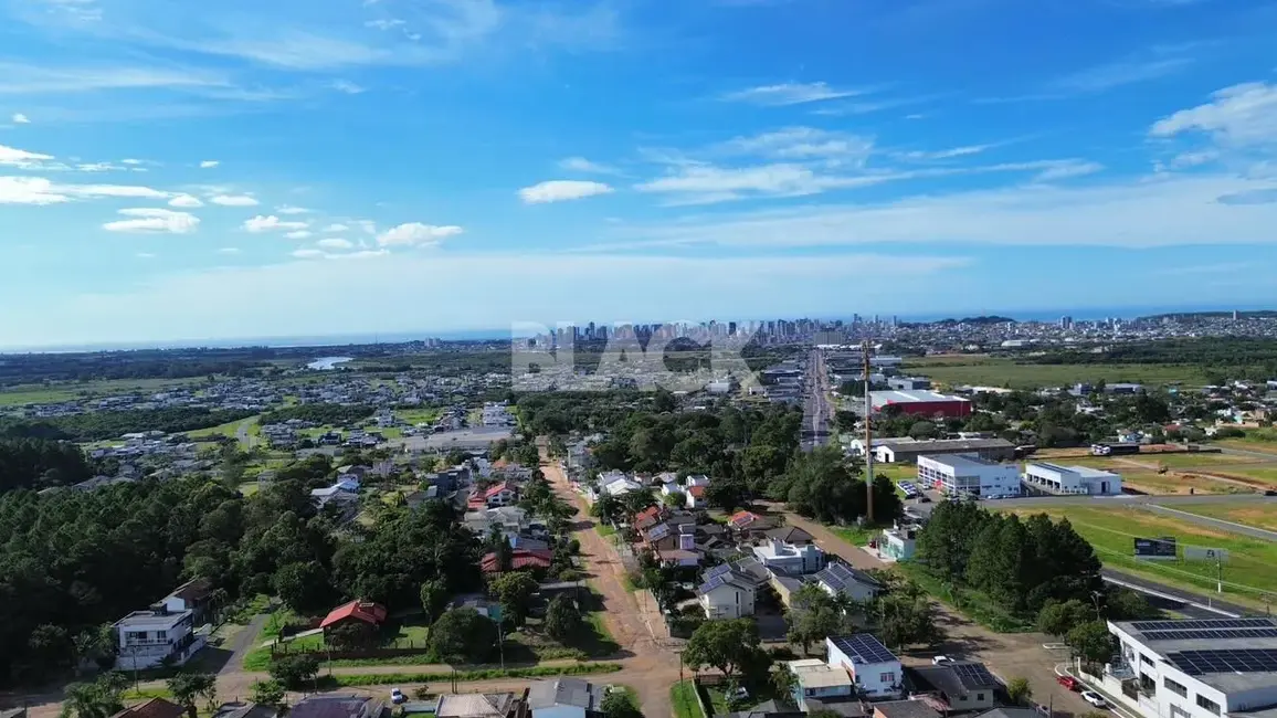 Foto 1 de Terreno / Lote à venda, 989m2 em Torres - RS