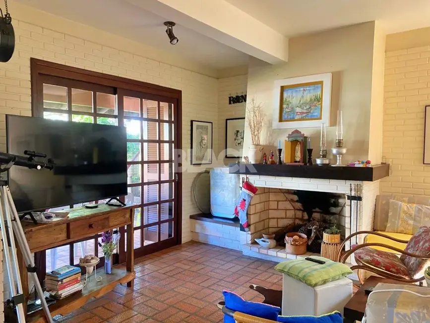 Foto 3 de Casa com 6 quartos à venda, 248m2 em Torres - RS