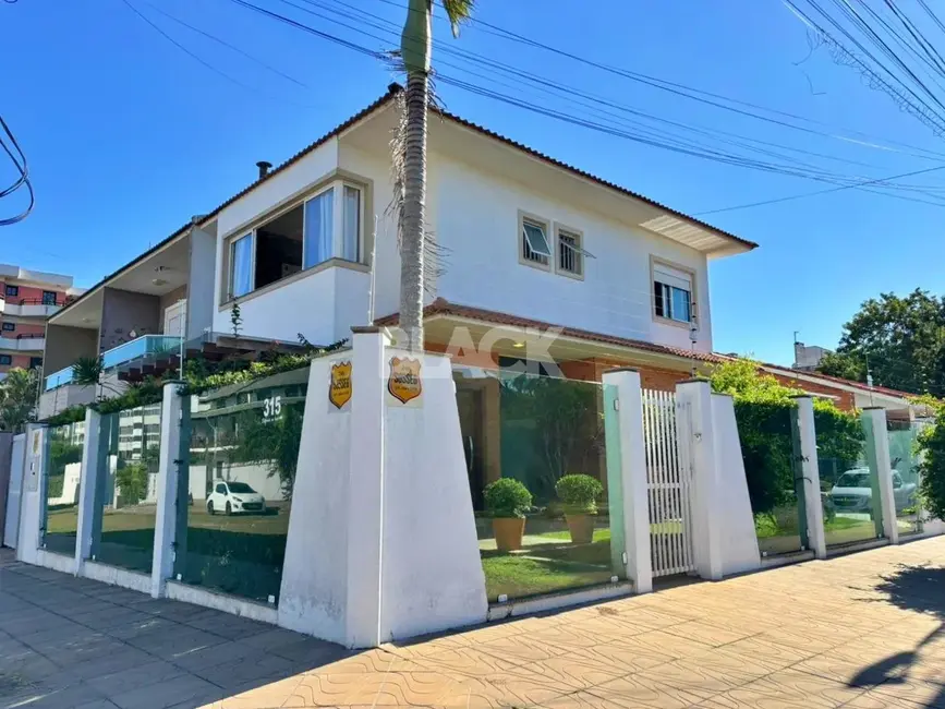 Foto 2 de Casa com 3 quartos à venda, 110m2 em Torres - RS