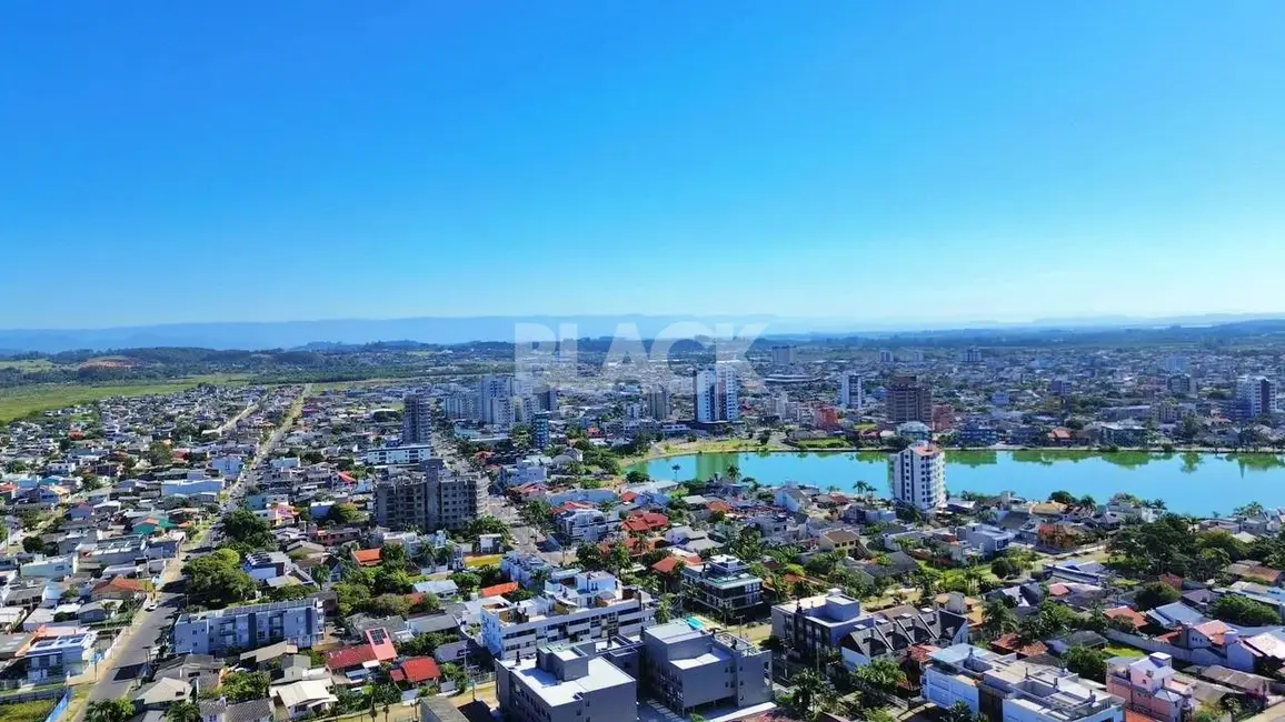 Foto 7 de Casa com 3 quartos à venda, 110m2 em Torres - RS
