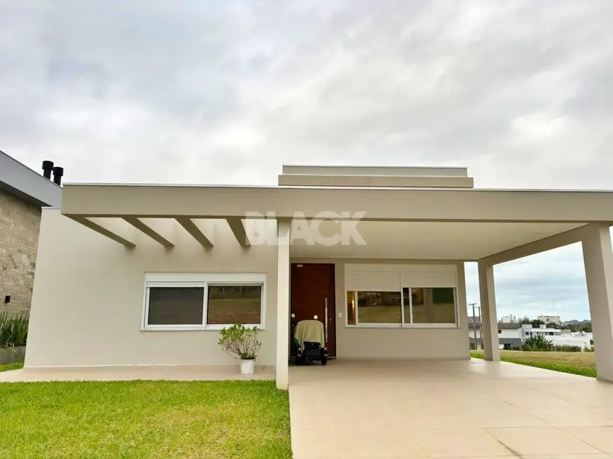 Casa de Condomínio com 3 quartos à venda, 248m2 em Torres - RS - imagem 3 Foto 3 de Casa de Condomínio com 3 quartos à venda, 248m2 em Torres - RS