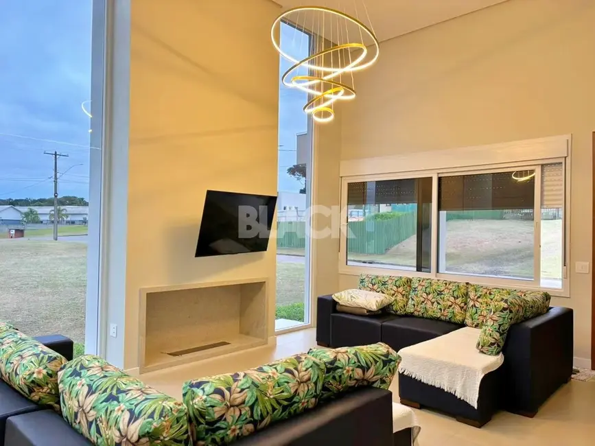 Casa de Condomínio com 3 quartos à venda, 248m2 em Torres - RS - imagem 4 Foto 4 de Casa de Condomínio com 3 quartos à venda, 248m2 em Torres - RS