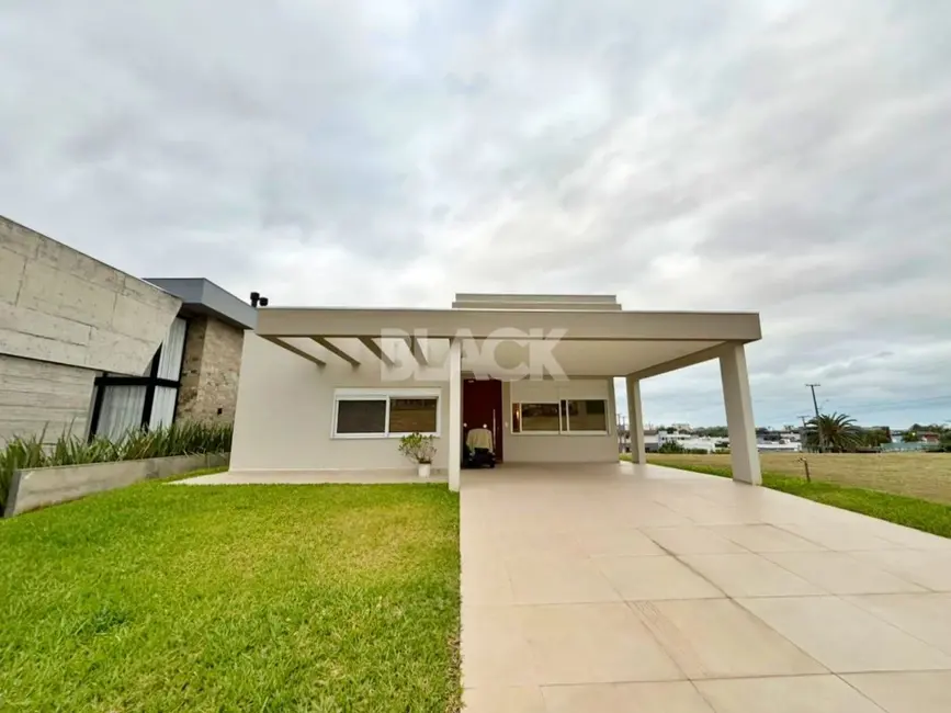 Casa de Condomínio com 3 quartos à venda, 248m2 em Torres - RS - imagem 2 Foto 2 de Casa de Condomínio com 3 quartos à venda, 248m2 em Torres - RS