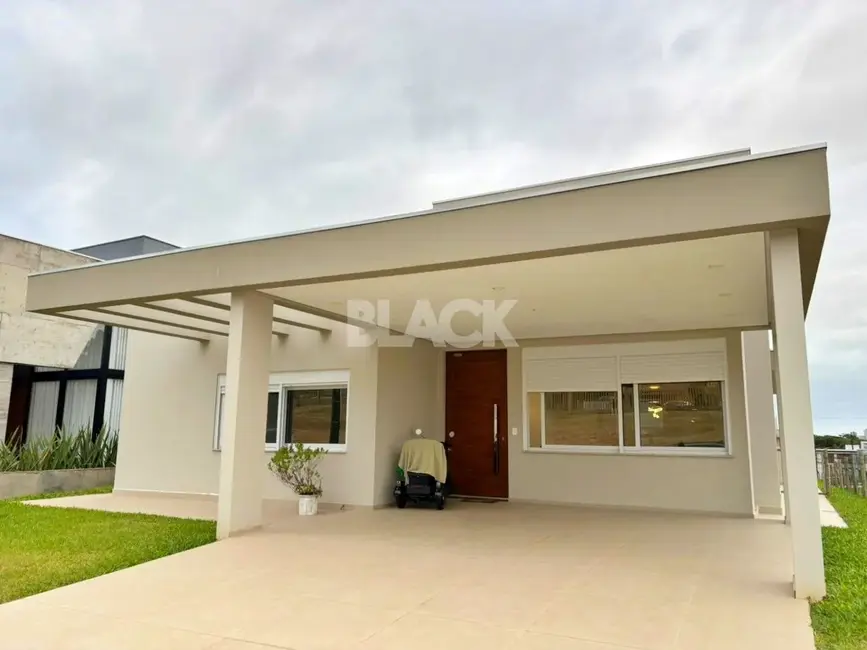 Casa de Condomínio com 3 quartos à venda, 248m2 em Torres - RS - imagem 1 Foto 1 de Casa de Condomínio com 3 quartos à venda, 248m2 em Torres - RS
