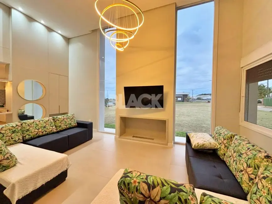 Casa de Condomínio com 3 quartos à venda, 248m2 em Torres - RS - imagem 6 Foto 6 de Casa de Condomínio com 3 quartos à venda, 248m2 em Torres - RS