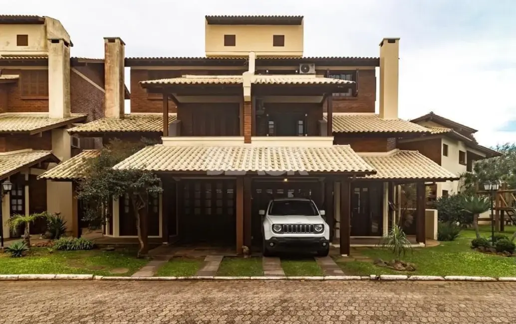Foto 1 de Casa com 4 quartos à venda, 187m2 em Torres - RS