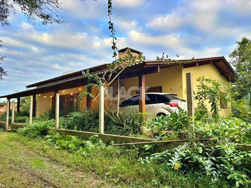 Foto 1 de Casa com 3 quartos à venda, 350m2 em Torres - RS