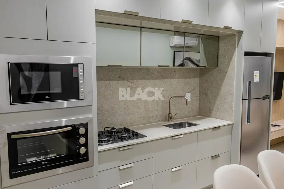 Foto 4 de Apartamento com 1 quarto à venda, 34m2 em Torres - RS
