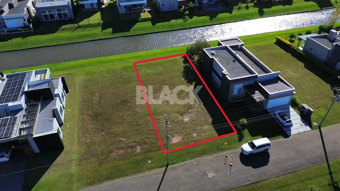 Foto 2 de Terreno / Lote à venda, 420m2 em Torres - RS